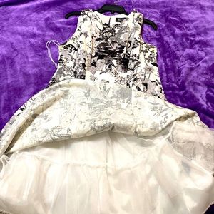 Black and white flower dress with pockets and built in crinoline underneath.